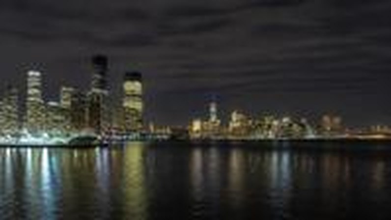 Jersey City and Manhattan skyline at night